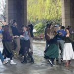 Swing Dance Society performing under the university arches in a flashmob